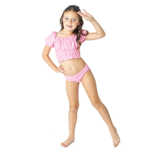 Girls pink eyelet two piece swimsuit with smocked puff sleeve bikini top and matching bottoms, cute kids swimwear.