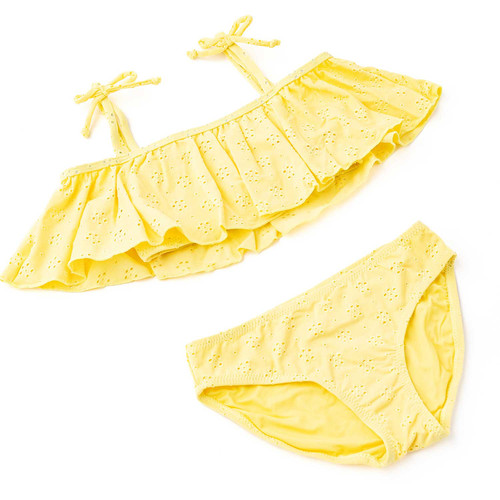 Girls butter yellow ruffle bikini set with eyelet texture and tie straps, trendy kids two piece swimsuit.