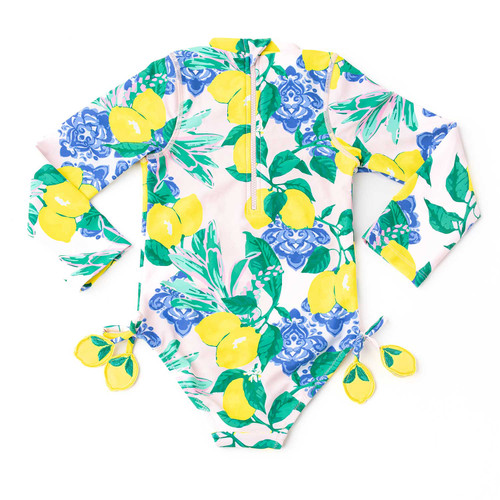 Girls citrus print long sleeve one piece swimsuit with full coverage design and tassel accents, comfortable kids swimwear for sun protection.