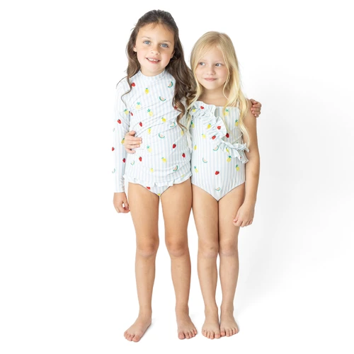 Girls embroidered one piece swimsuit in pastel stripe, cute kids swimwear shown on models, perfect for beach and pool days.