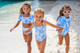 Shade Critters Blue Bouquet Smocked Girls One Piece Swimsuits on beach