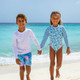 Family Swimwear at beach featuring Shade Critters Floral Patchwork Boys 4 way Stretch Swim Trunk
