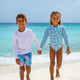 Family Swimwear at beach featuring Shade Critters Floral Patchwork Boys 4 way Stretch Swim Trunk