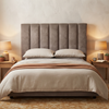 Florence vertical panelled upholstered bedhead in a neutral bedroom, front view