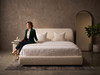 Front view of Ravenna upholstered bed frame and rounded padded headboard