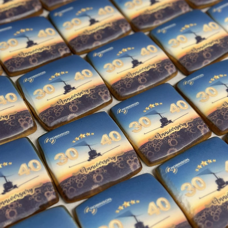 Robinson Helicopter anniversary cookies with a photo print.