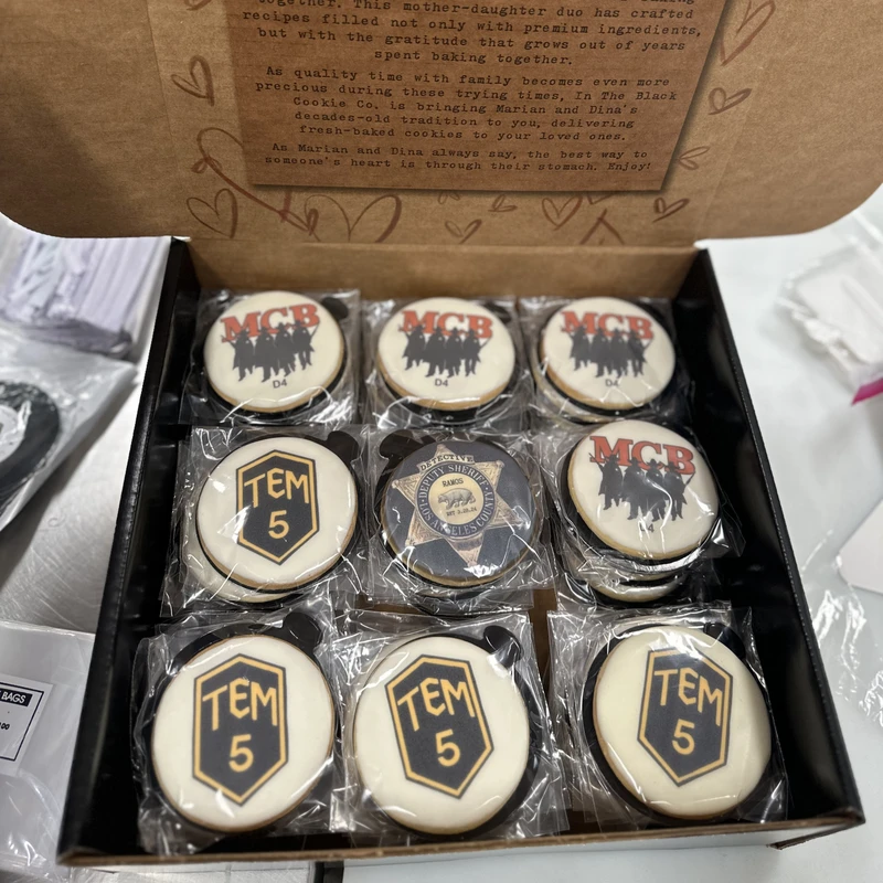 A gift box of individually wrapped MCB and TEM 5 logo cookies.