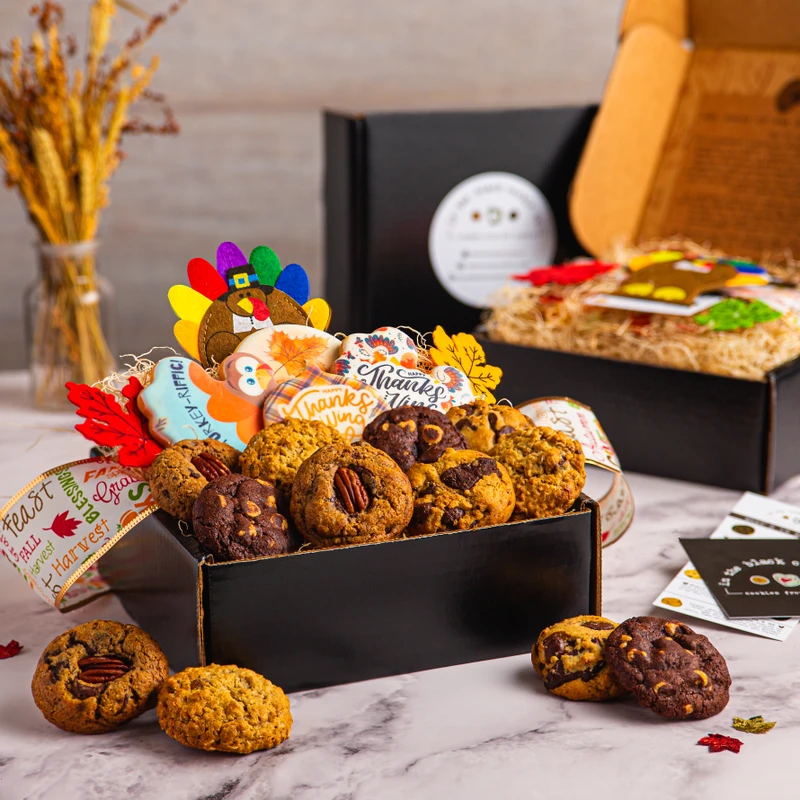 Gobble Gobble box of cookies with frosted turkey cookies and fall leaves