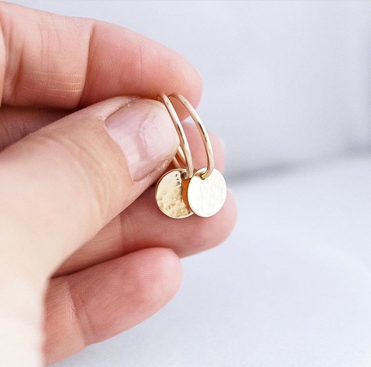 infinity hoop earrings { gold + silver }