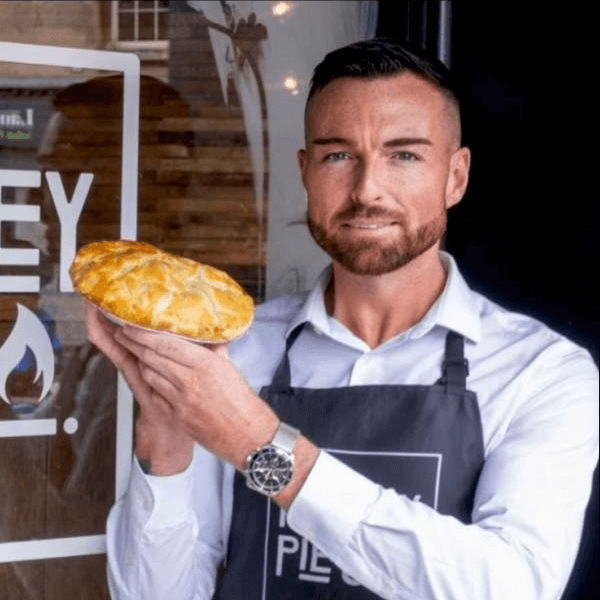 Scott McGinlay holding one of his pies