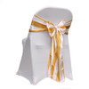 gold and white striped satin sashes on folding chairs
