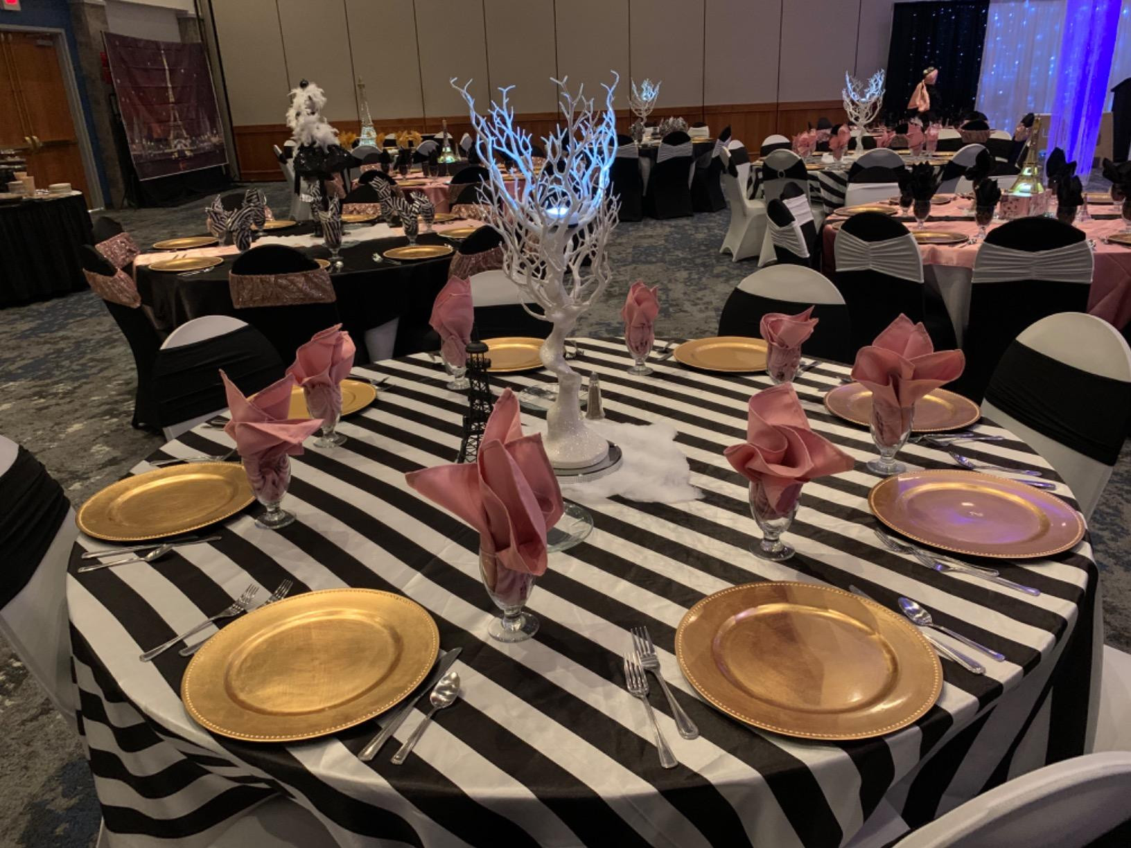 132 Inch Round Satin Tablecloth Black/White Striped in use