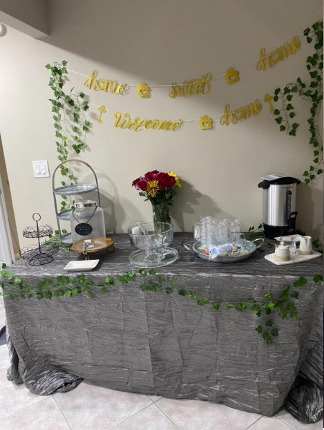 90 x 156 Inch Rectangular Crinkle Taffeta Tablecloth Dark Silver / Platinum in use