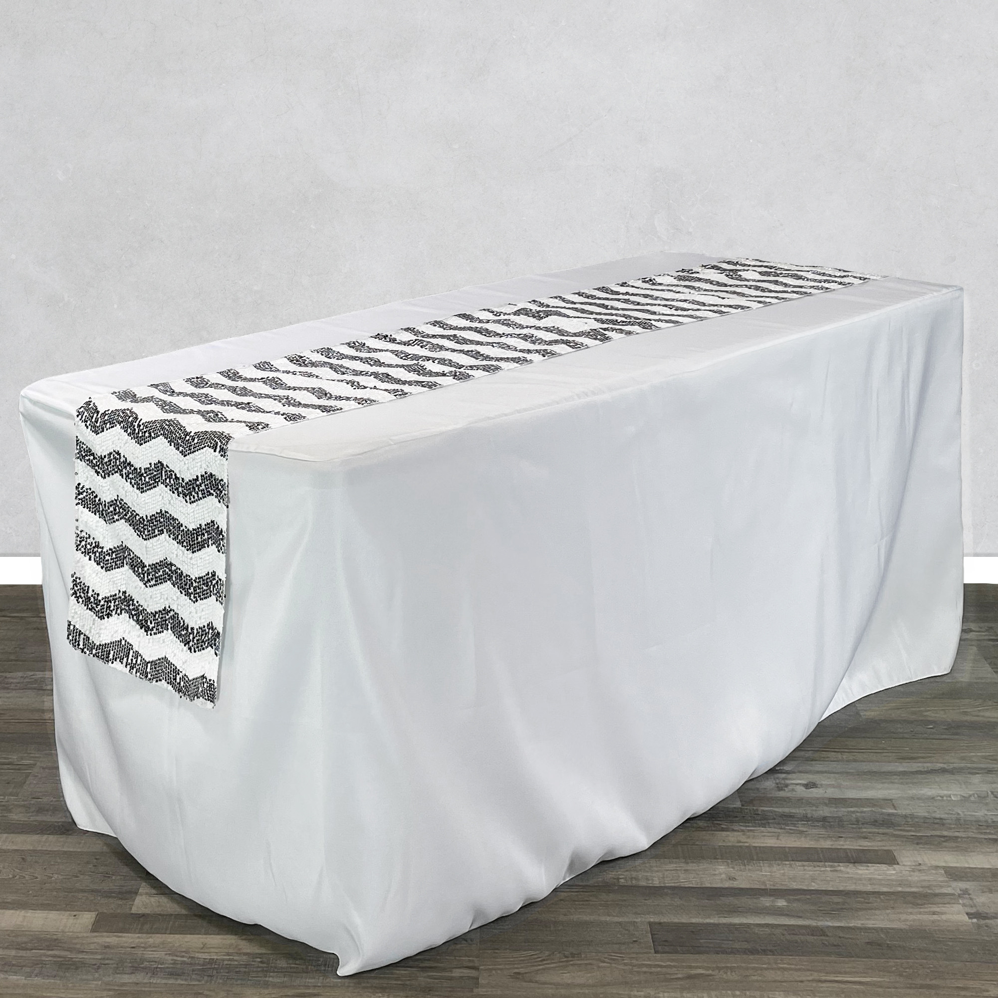 14 x 108 Inch Chevron Sequin Table Runner White and Black on rectangular table