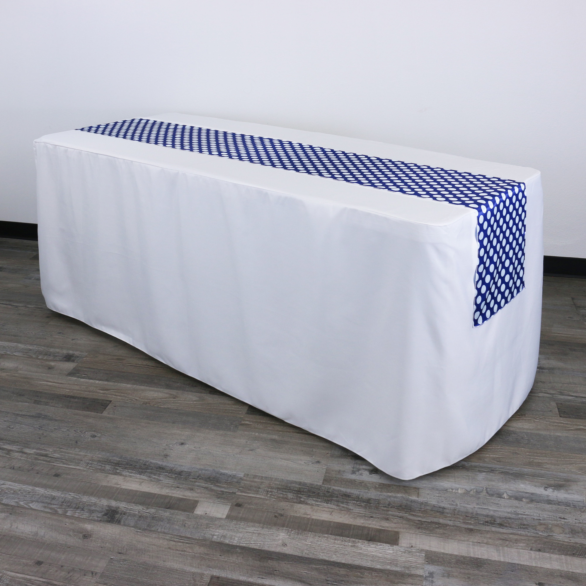 14 x 108 Inch Satin Table Runner Royal Blue/White Polka Dots on a rectangular table