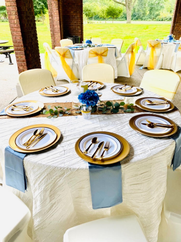 108 Inch Round Crinkle Taffeta Tablecloth Ivory in use