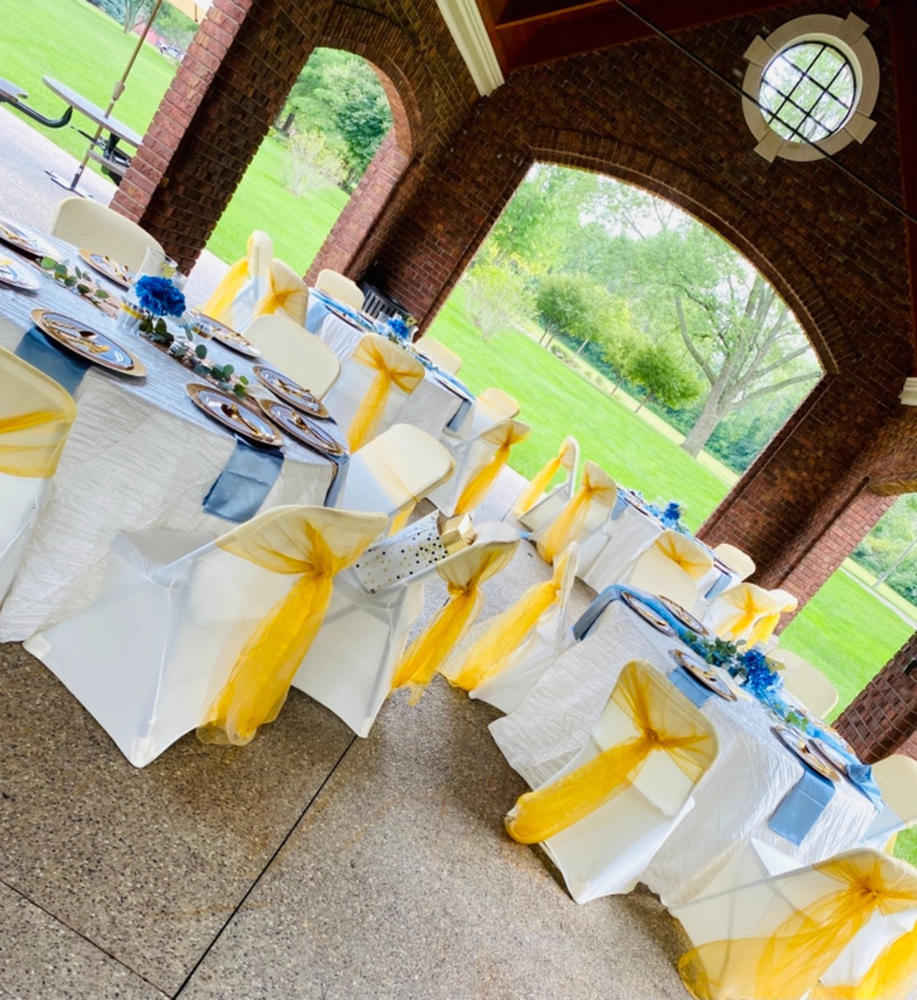108 Inch Round Crinkle Taffeta Tablecloth White in use
