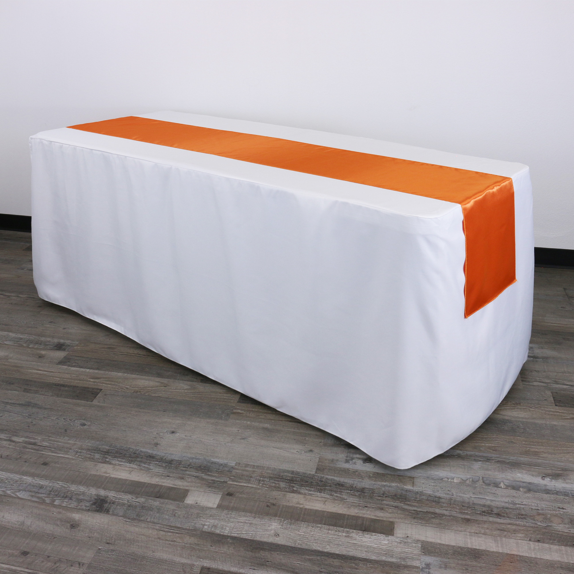 14 x 108 Inch Satin Table Runner Orange on rectangular table