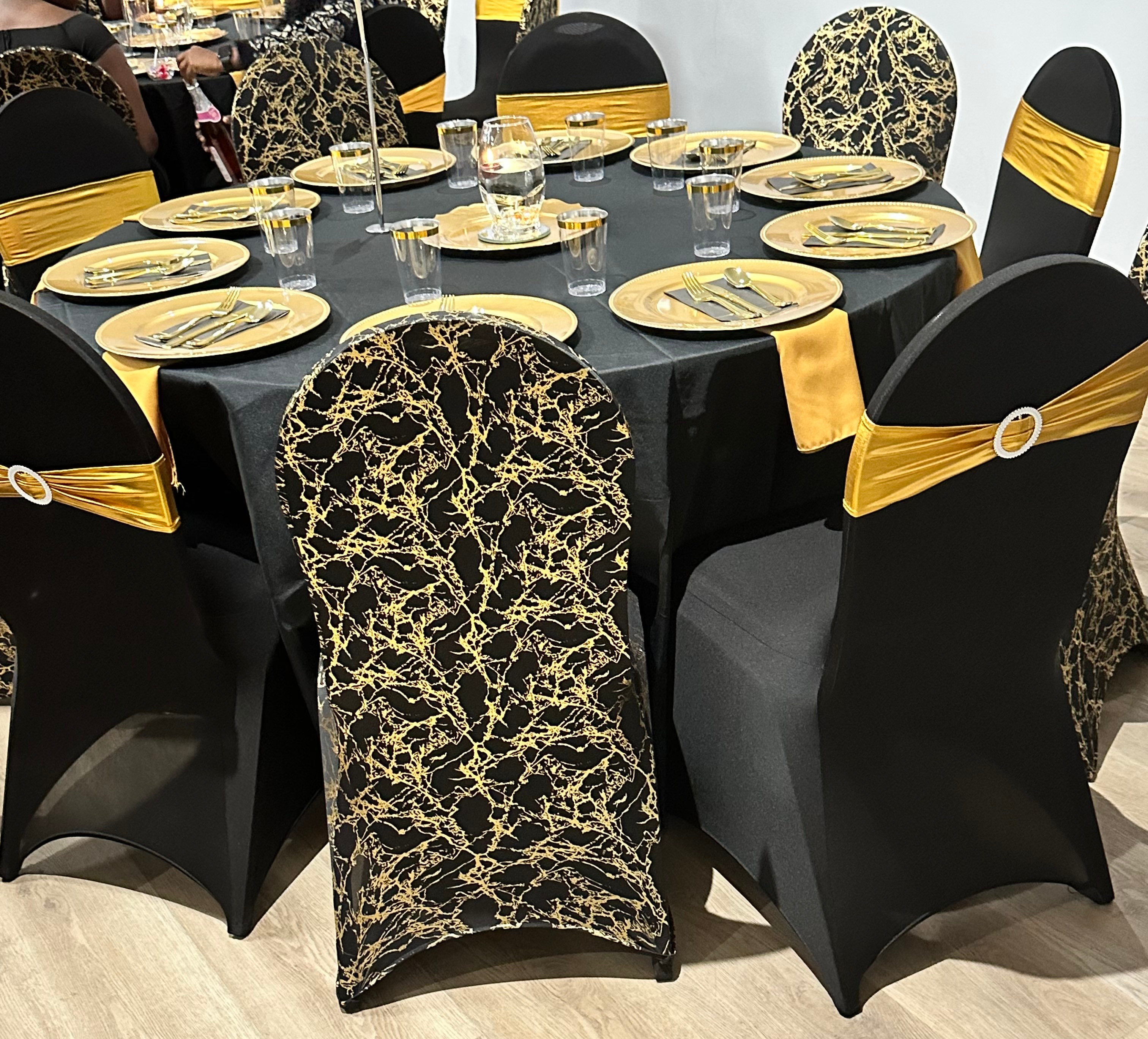 Stretch Spandex Banquet Chair Cover Black With Gold Marbling In use