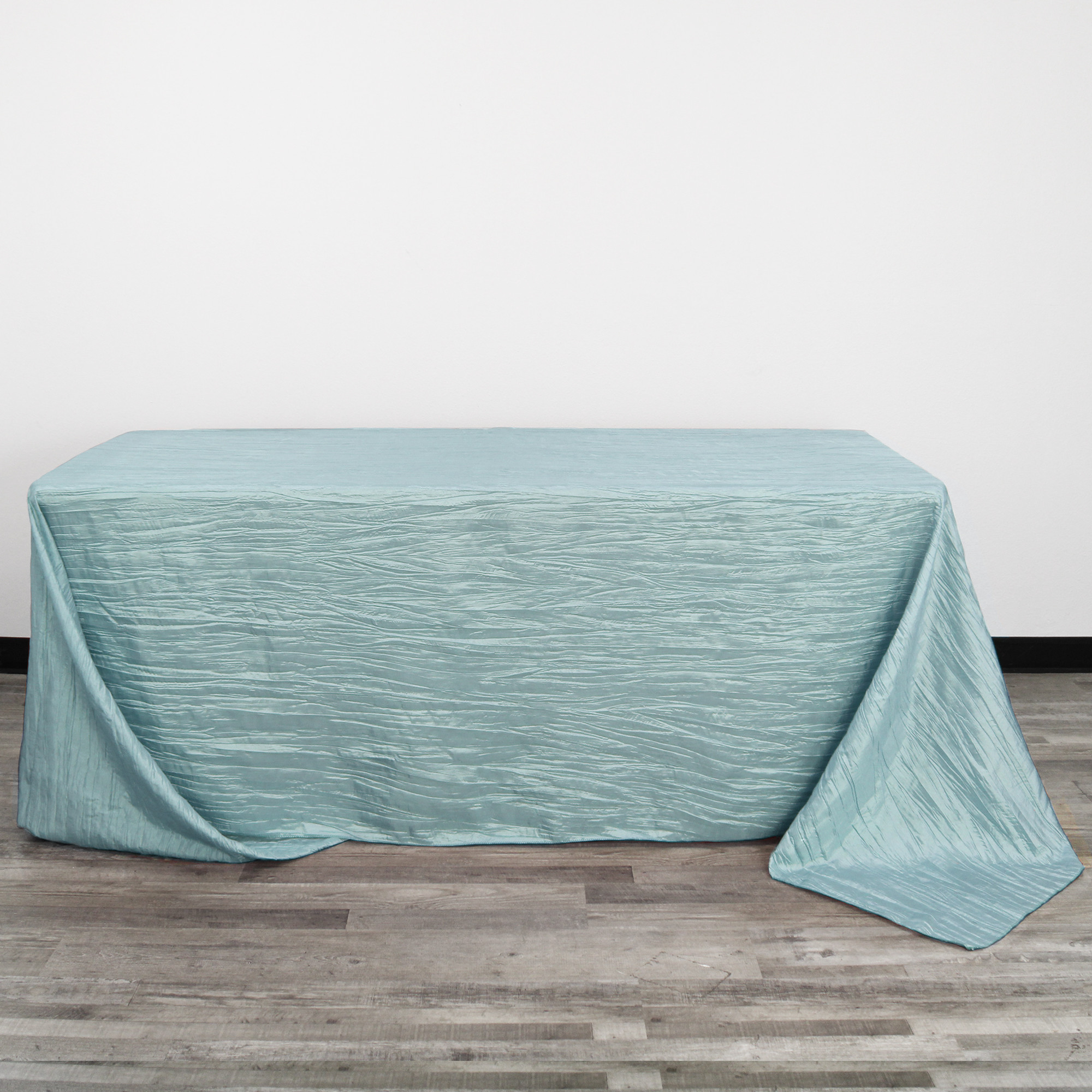 90 x 132 Inch Rectangular Crinkle Taffeta Tablecloth Dusty Blue corner