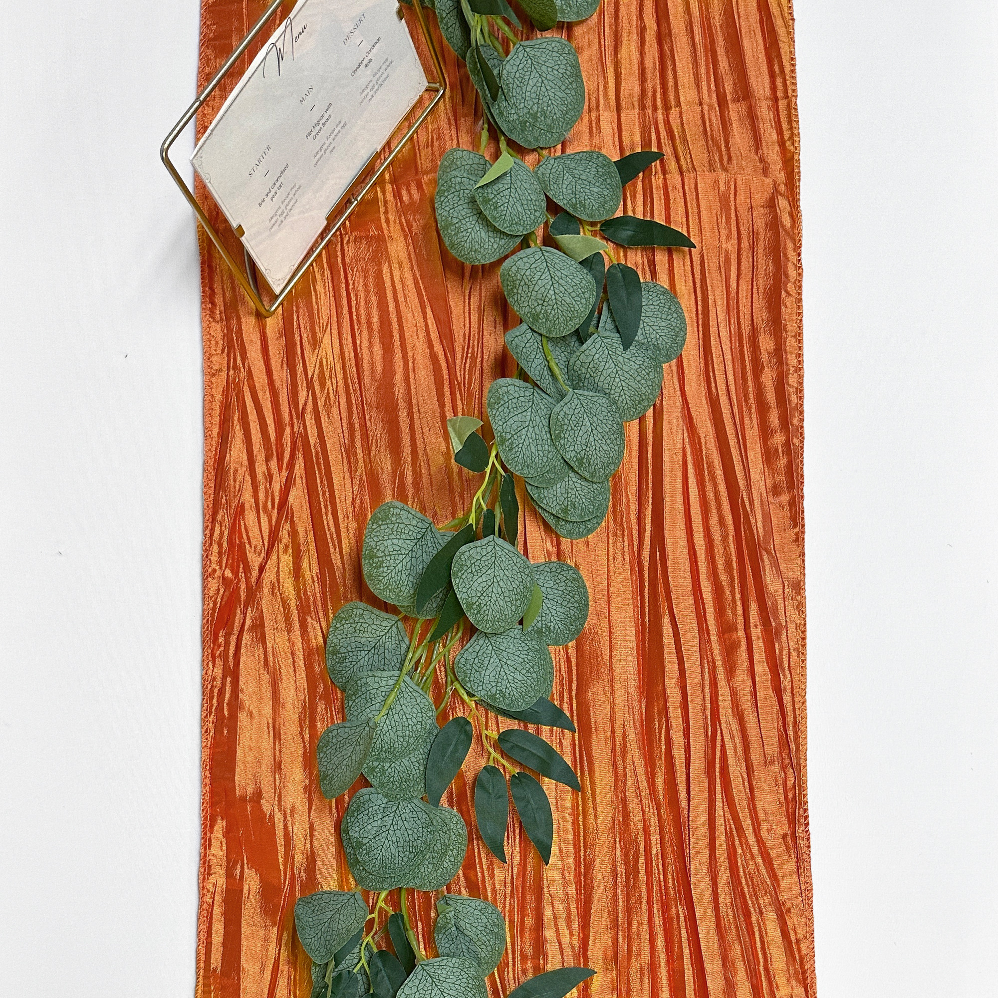 14 x 108 Inch Crinkle Taffeta Table Runner Terracotta flat lay