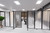 Two Polycarbonate Room Divider 360 Dividers dividing a room with doors attached to each in a French Doors configuration