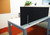 Use the SoundSorb Desktop Privacy Panels as a modesty panel.