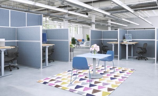 The office is using cubicles for their employees to have their own room workspace.
