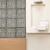Hiser handmade patterned tile in light blue with pale oak and white dove cabinets