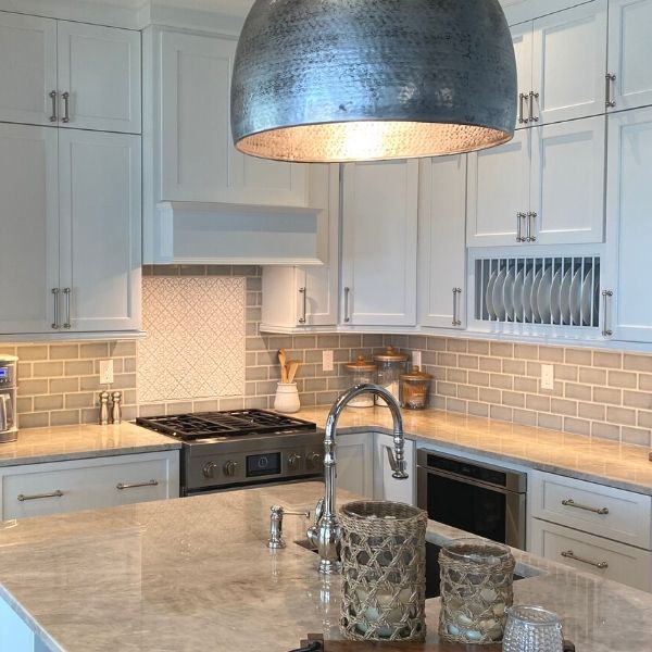 Gorgeous two story kitchen, granite countertops, pendant lighting, blue  mosaic backsplash tile, g…