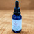 Delta-9 THC hemp oil drops 90mg in blue glass bottle with dropper, organic MCT oil, hemp-derived and farm bill compliant.