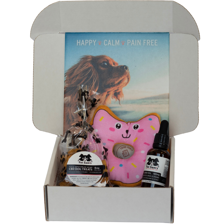 Gift set for small dogs, under 20 pounds. Includes 100mg/30ml oil drops, one dozen 2mg each treats, squeaky toy.