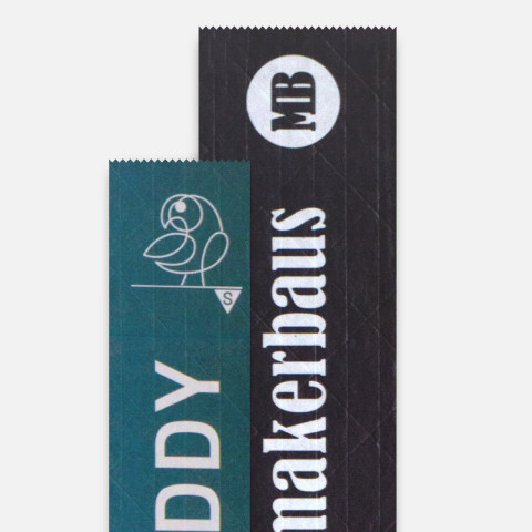 custom packaging tape sample—3-loop digital print on reinforced kraft (white/brown)