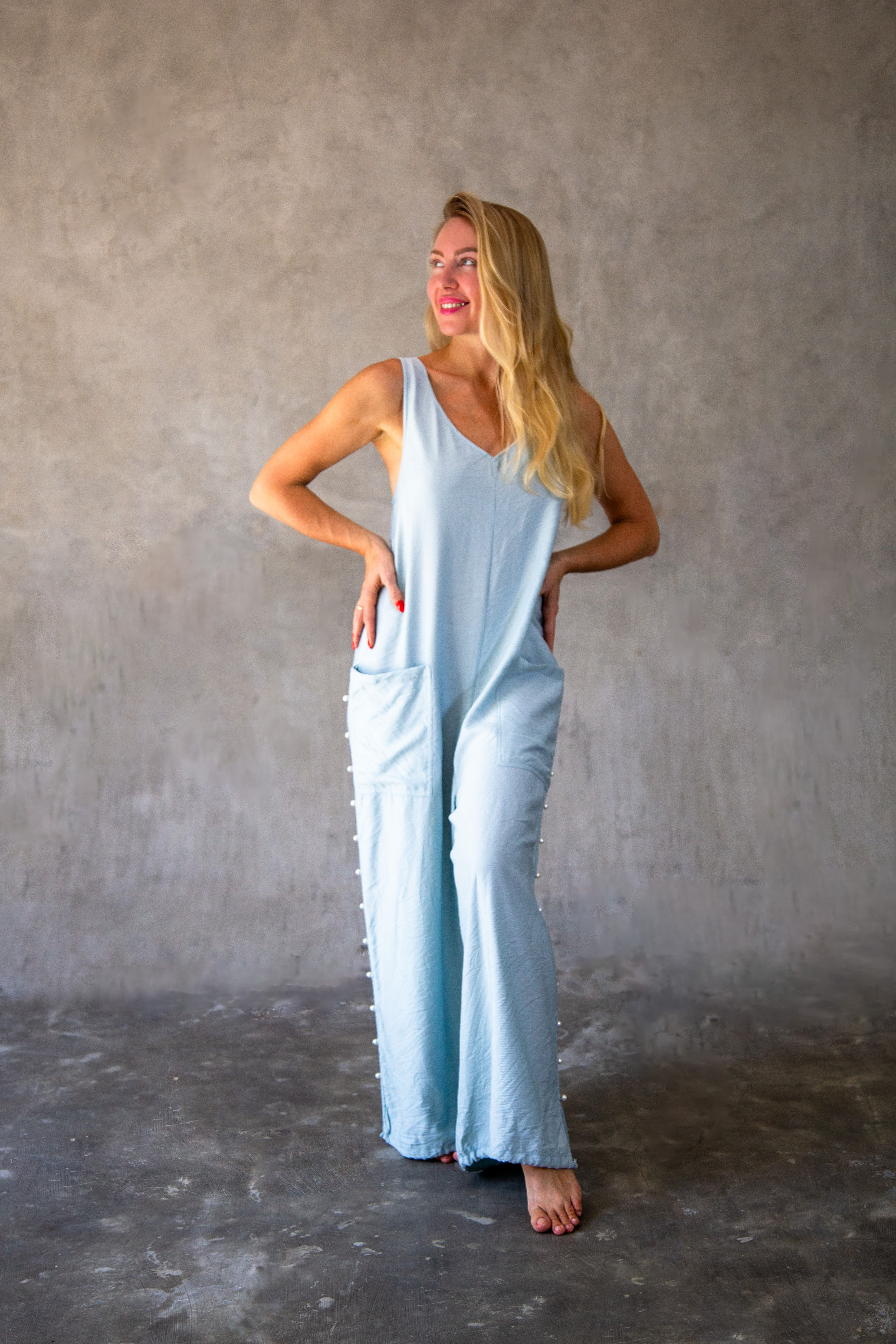Elegant Tiffany blue resort jumpsuit for women, featuring a flowy wide-leg fit and minimal luxury design. Limited stock available