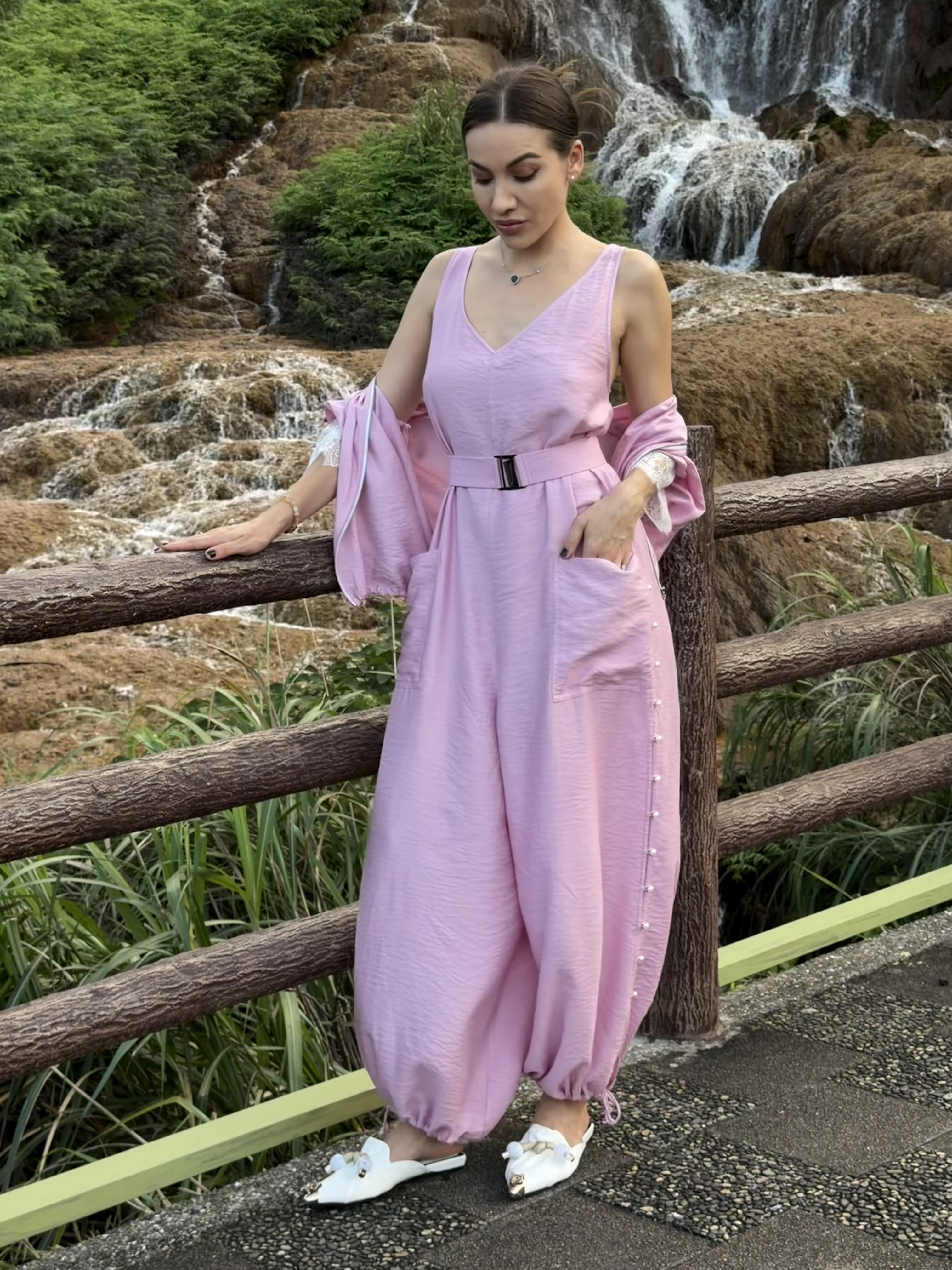 Breathable summer pink jumpsuit in lightweight flowy fabric. Sleeveless design keeps you cool while the palazzo cut adds graceful movement. Eluvare summer essentials. Limited stock
