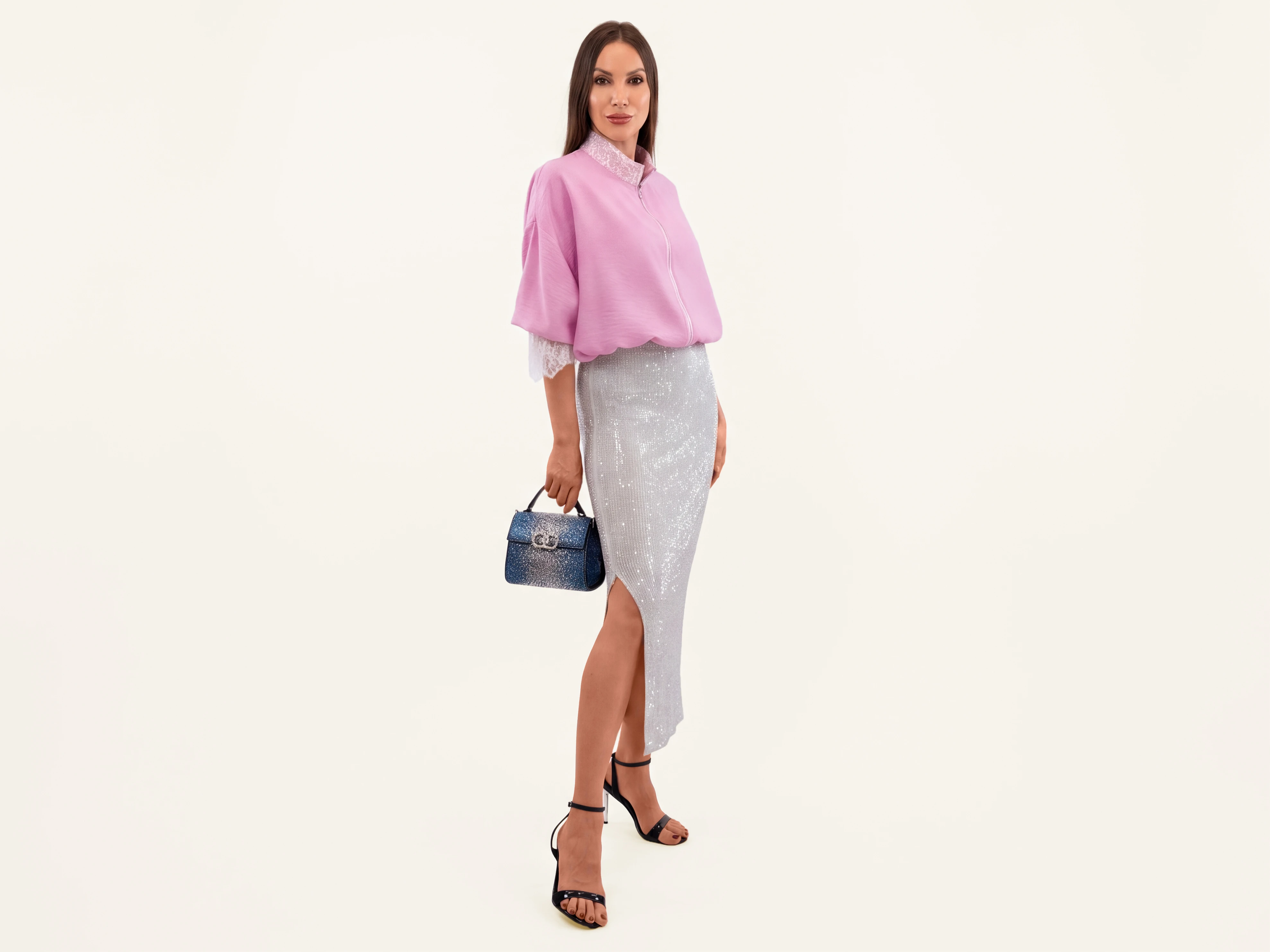 Lightweight pink outerwear with adjustable proportions and delicate lace accents.