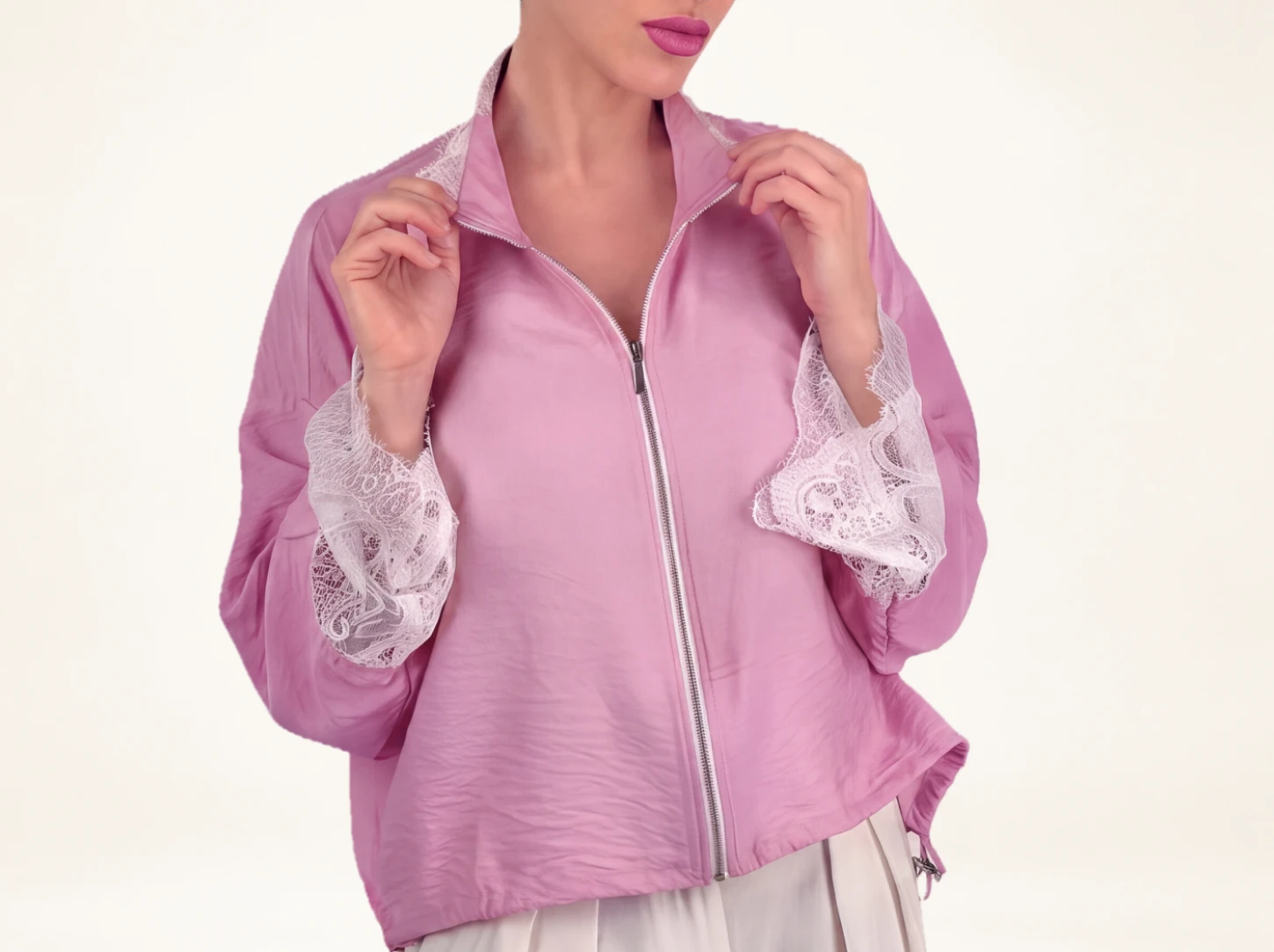 Pink bomber jacket with delicate lace details, available in limited
quantities for women who love feminine luxury style