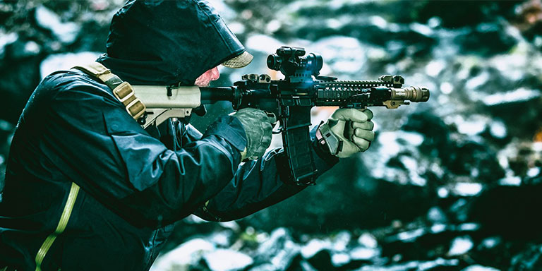Man outside dressed for cold weather training at the range