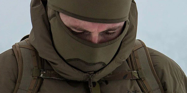 Man wearing balaclava and insulated clothing