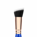Bdellium Tools Golden Triangle Duo Fibre Slanted Kabuki Brush 954 (close up). Sold by Norcostco.