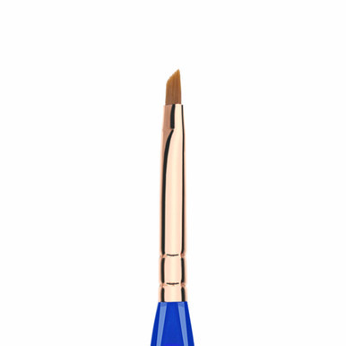Bdellium Tools Golden Triangle Small Angle Brush 762 (close up). Sold by Norcostco.