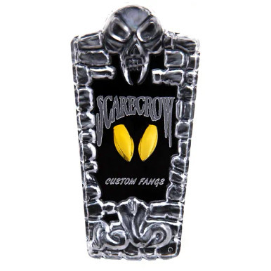 Scarecrow Glam Vampire Fangs in Gold (in packaging). Sold by Norcostco.