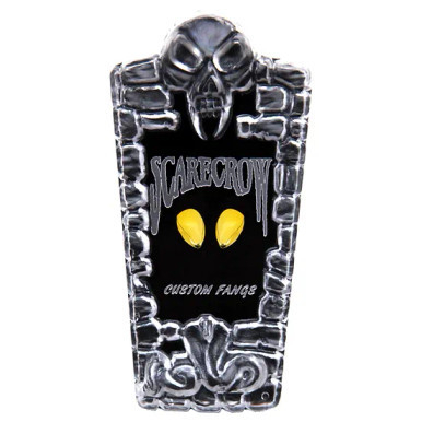 Scarecrow Small Glam Vampire Fangs in Gold (in packaging). Sold by Norcostco.