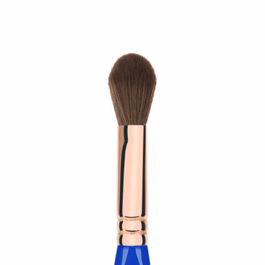 Bdellium Tools Golden Triangle Face Blending Brush 940 (close up, angle). Sold by Norcostco.
