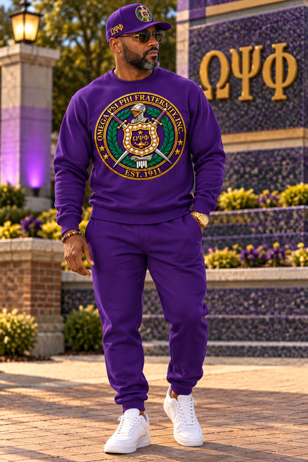 OMEGA PSI PHI ROYAL HERITAGE

Bold tradition meets luxury-inspired design in the Royal Heritage collection. Created with dimensional royal-purple and old-gold detailing, this artwork presents the symbols and principles of Omega Psi Phi in an elaborate architectural composition worthy of the fraternity’s distinguished history.

Towering pillars frame the centerpiece and prominently display Manhood, Scholarship, Perseverance, and Uplift, while the helmet, shield, swords, laurel wreath, gauntlet, lamp, and signature ΩΨΦ lettering create a commanding centerpiece. Rich metallic-inspired highlights and carefully layered details give the artwork exceptional depth and presence.

The finishing OMEGA PSI PHI — Fraternity, Incorporated — Est. 1911 typography gives the design a refined, complete presentation.

Designed for brothers who want their Omega apparel to feel distinguished, substantial, and unmistakably premium.

Heritage. Brotherhood. Excellence. Omega.