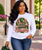 AKA Educators — Championing, Serving, Empowering

Celebrate the women who do more than teach—they inspire, empower, serve, and transform the world.

Our AKA Educators design is a sophisticated tribute to the lasting impact of Alpha Kappa Alpha women in education. Rich layers of signature pink and green come together in an elevated collegiate-inspired composition featuring books, ivy, a globe, and classic AKA details, beautifully framed by the message:

CHAMPIONING • SERVICE • EMPOWERING • SISTERHOOD • TRANSFORMING THE WORLD

Finished with an elegant “Educators” script, this statement piece honors educators who lead with knowledge, purpose, sisterhood, and service. The intricate artwork gives the design a polished, high-end look while remaining unmistakably AKA.

Perfect for teachers, professors, administrators, counselors, educational leaders, retired educators, and AKA women working throughout the field of education.

Pair it with denim and a crisp white Oxford for an effortlessly polished look, or style it with slacks, a skirt, or your favorite AKA accessories.

AKA Educators — because educating is more than a profession. It’s a legacy of service, leadership, and transformation.
