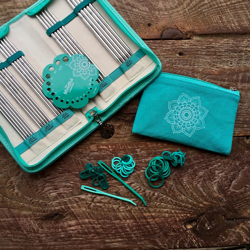 Double Pointed Needle Set - Mindful Compassion 6” in teal, with case and accessories, featuring a mandala design and multiple needles.
