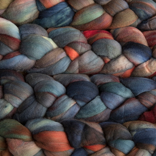 Malabrigo Nube - Pocion, 100% merino wool roving, hand-dyed in Uruguay, available as 4oz of vibrant Pocion colorway for spinning and felting fiber art projects seamlessly.