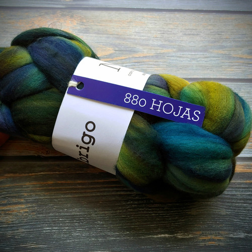 Malabrigo Nube – Hojas 100% Merino Wool Roving in vibrant green, blue, and yellow hues, 4oz fiber for spinning and felting, made by Malabrigo.