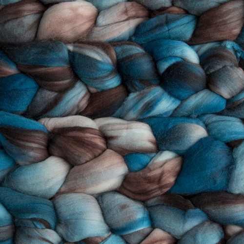 Malabrigo Nube Persia 100% Merino Wool Roving, 4oz weight, blue, brown, and cream shades, suitable for spinning and felting, Merino wool fiber for crafters.